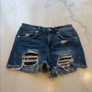 Blank NYC Distressed Dark Blue Denim Shorts with Frayed Hem and mesh detail